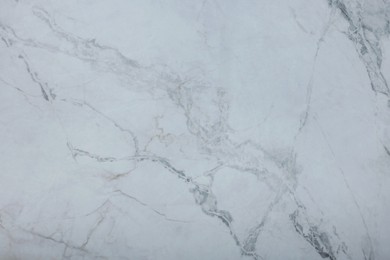 Photo of Texture of white marble surface as background, top view