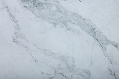 Photo of Texture of white marble surface as background, top view