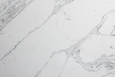 Photo of Texture of marble surface as background, top view