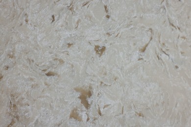 Photo of Texture of stone surface as background, top view