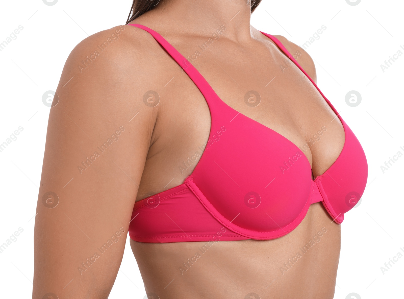 Woman wearing beautiful pink bra on white background, closeup Photo of Woman wearing beautiful pink bra on white background, closeup