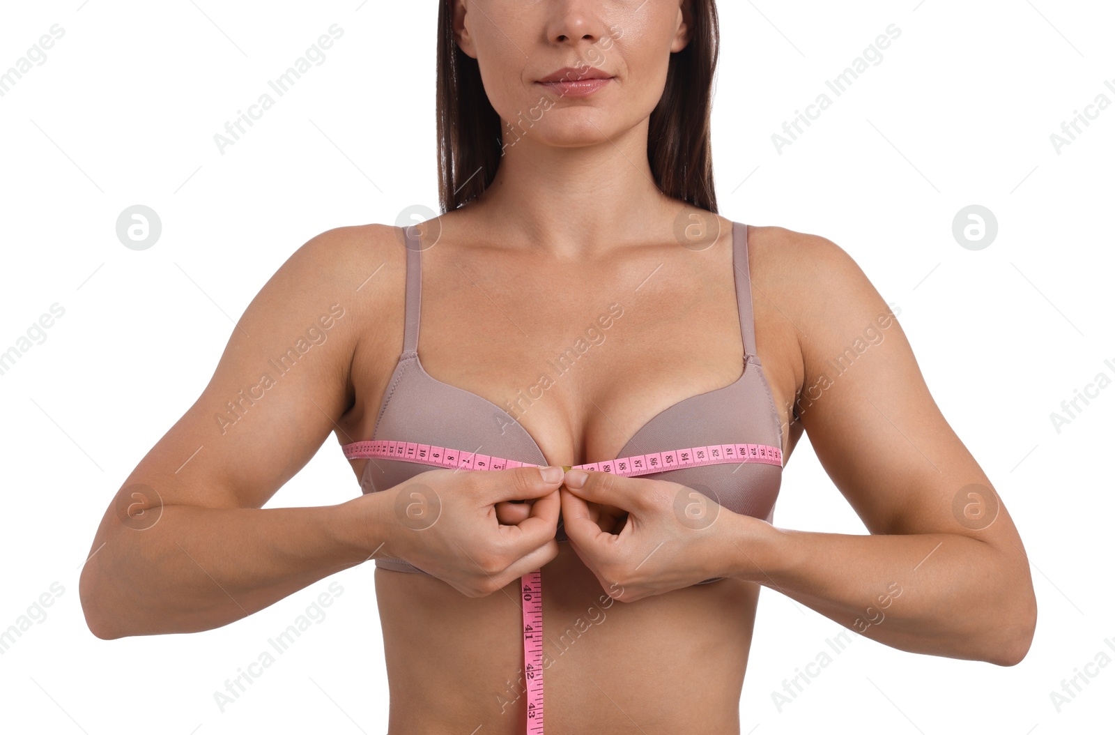 Woman in beautiful bra measuring breast circumference on white background, closeup Photo of Woman in beautiful bra measuring breast circumference on white background, closeup