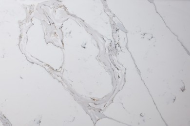 Photo of Texture of marble surface as background, top view