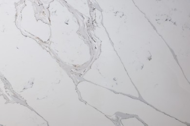 Photo of Texture of marble surface as background, top view