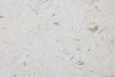 Photo of Texture of stone surface as background, top view