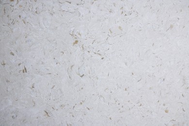Photo of Texture of stone surface as background, top view