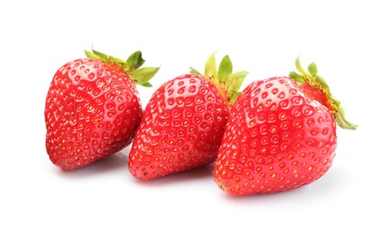 Photo of Three fresh ripe strawberries isolated on white