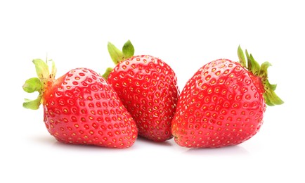 Photo of Three fresh ripe strawberries isolated on white