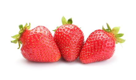 Photo of Three fresh ripe strawberries isolated on white