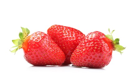 Photo of Three fresh ripe strawberries isolated on white
