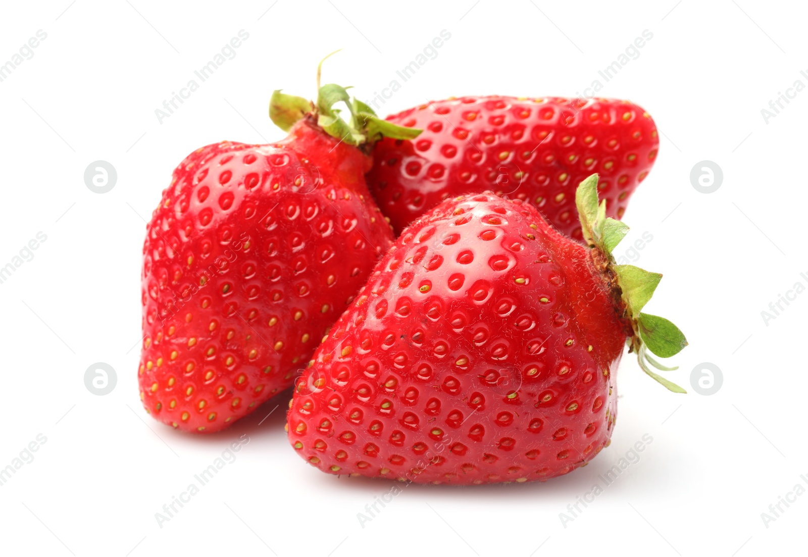 Three fresh ripe strawberries isolated on white Photo of Three fresh ripe strawberries isolated on white