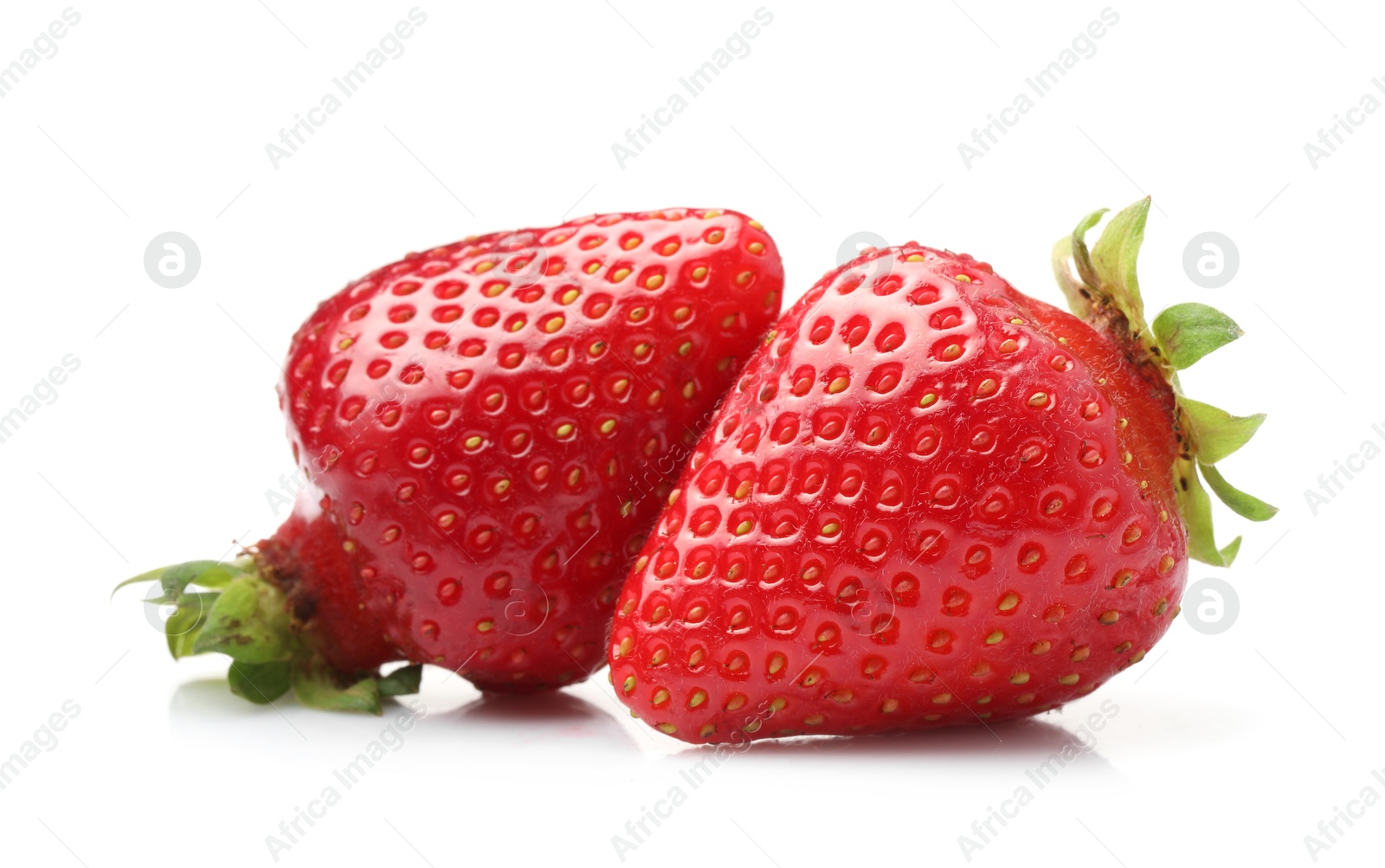 Two fresh ripe strawberries isolated on white Photo of Two fresh ripe strawberries isolated on white
