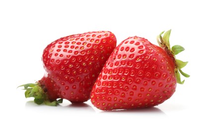 Photo of Two fresh ripe strawberries isolated on white