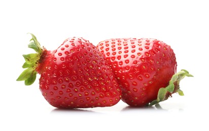 Photo of Two fresh ripe strawberries isolated on white