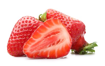 Photo of Whole and cut strawberries isolated on white