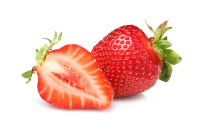 Photo of Whole and cut strawberries isolated on white