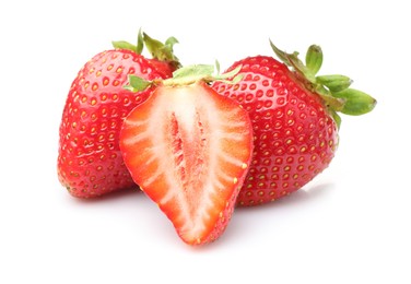 Photo of Whole and cut strawberries isolated on white