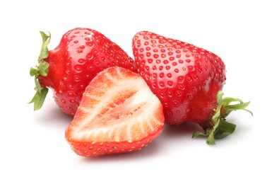 Photo of Whole and cut strawberries isolated on white