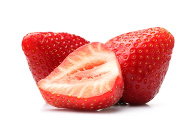 Photo of Whole and cut strawberries isolated on white
