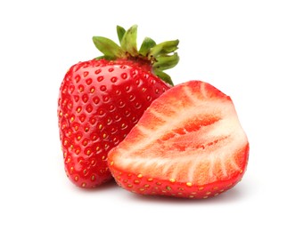 Photo of Whole and cut strawberries isolated on white