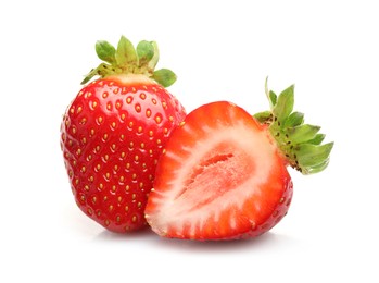Photo of Whole and cut strawberries isolated on white
