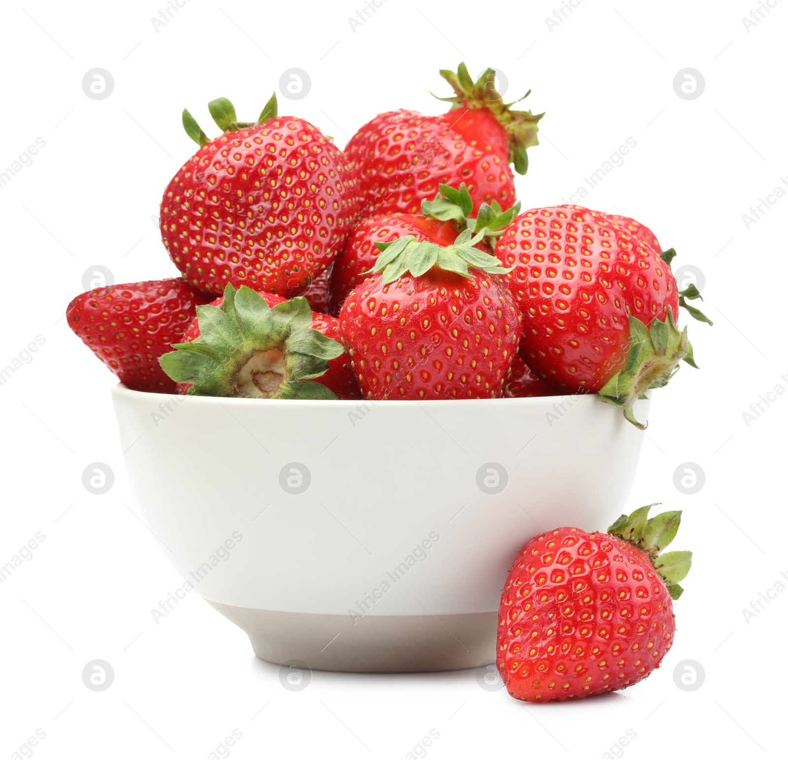 Fresh strawberries in bowl isolated on white Photo of Fresh strawberries in bowl isolated on white
