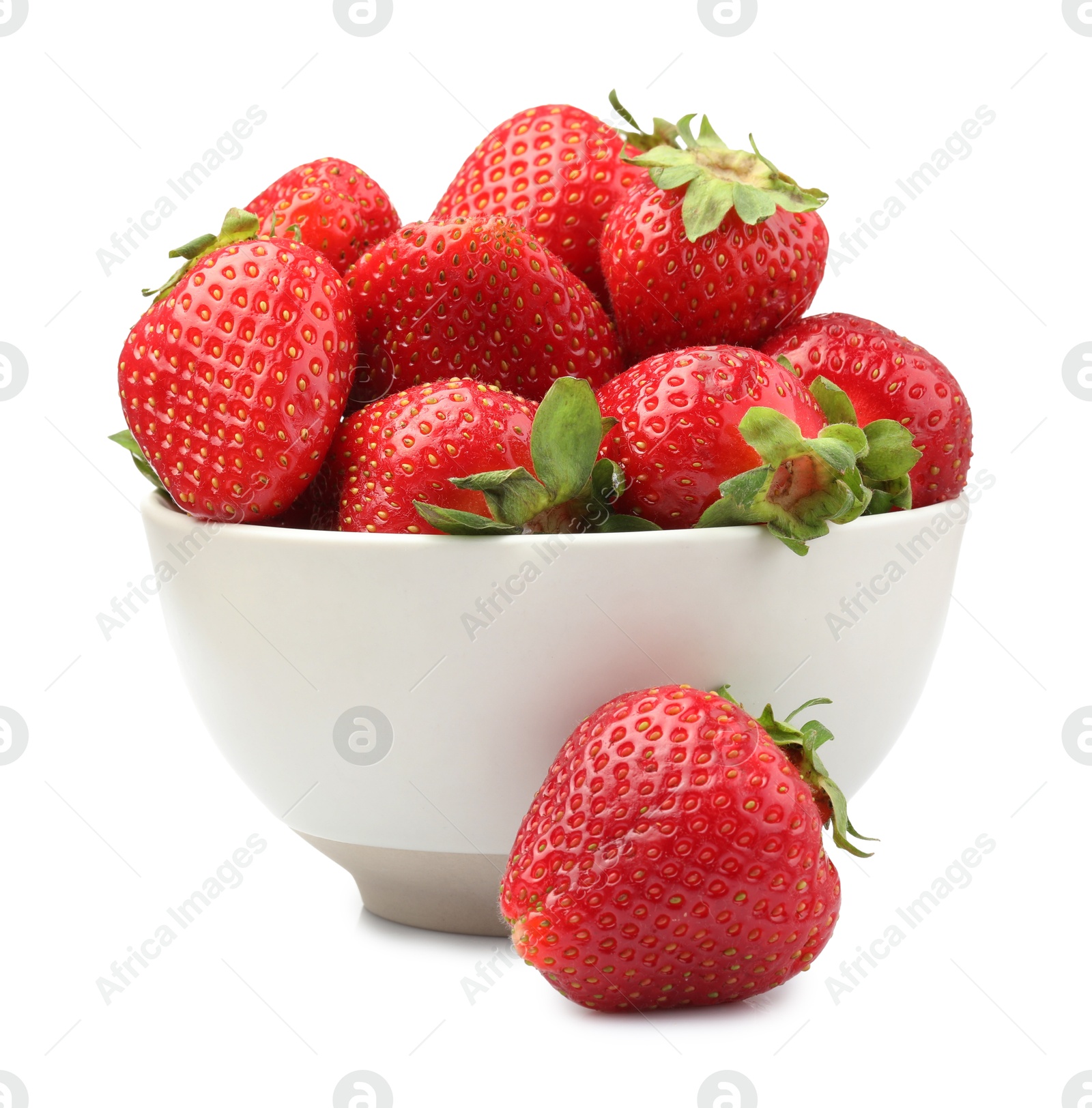 Fresh strawberries in bowl isolated on white Photo of Fresh strawberries in bowl isolated on white