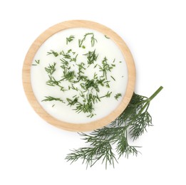 Photo of Delicious yogurt in bowl and dill isolated on white, top view