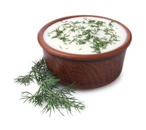 Photo of Delicious yogurt in bowl and dill isolated on white