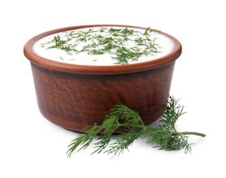 Photo of Delicious yogurt in bowl and dill isolated on white