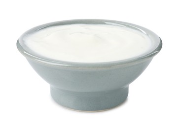 Photo of Delicious yogurt in bowl isolated on white