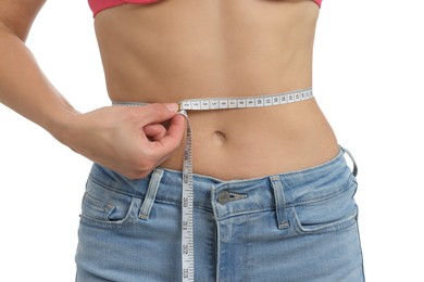 Photo of Woman measuring waist circumference on white background, closeup