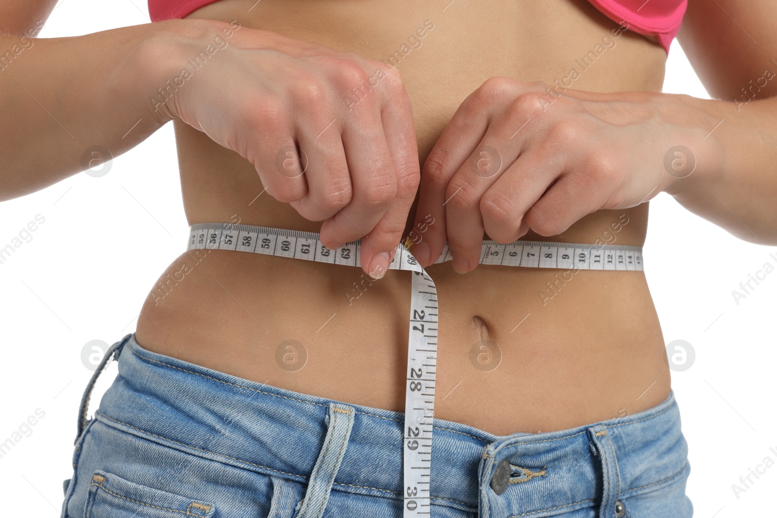 Photo of Woman measuring waist circumference on white background, closeup