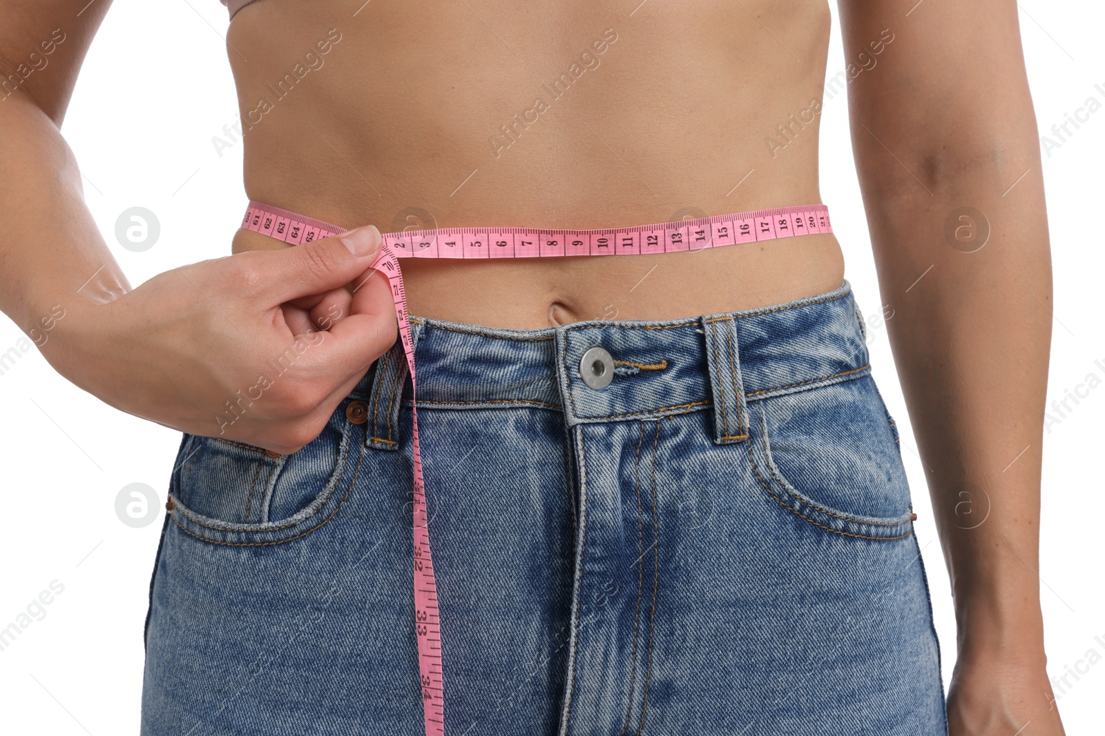 Photo of Woman measuring waist circumference on white background, closeup