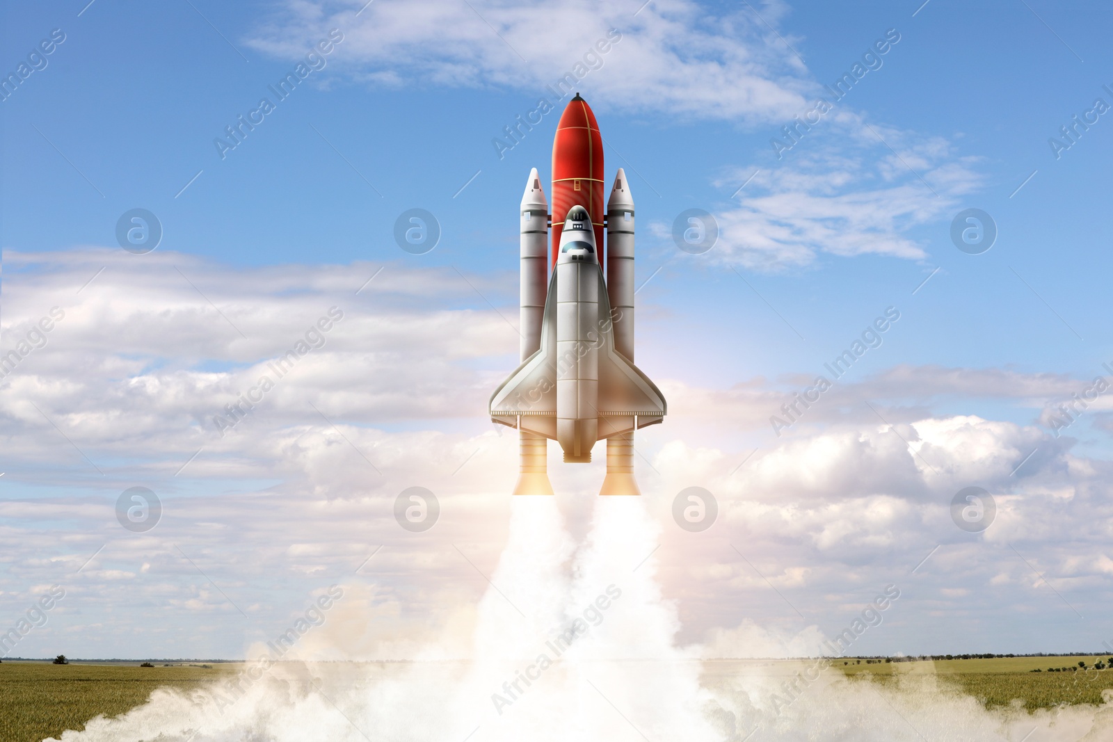 Image of Launch of space rocket in field on sunny day