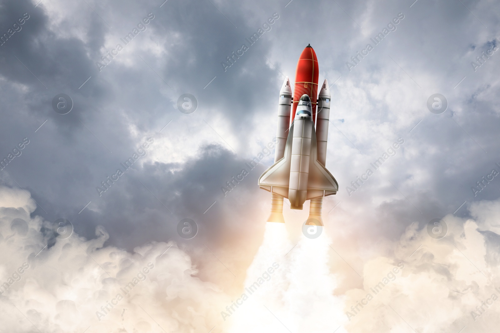 Modern space rocket in beautiful cloudy sky Image of Modern space rocket in beautiful cloudy sky