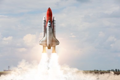 Image of Launch of modern space rocket in field outdoors