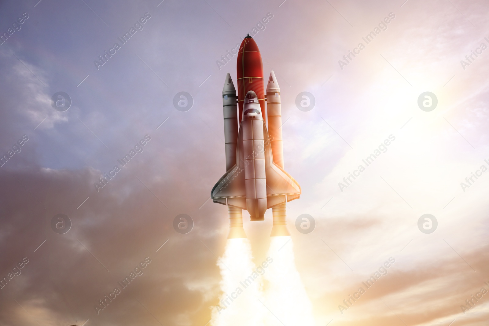 Modern space rocket in beautiful cloudy sky Image of Modern space rocket in beautiful cloudy sky