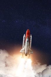Image of Modern space rocket in beautiful starry sky