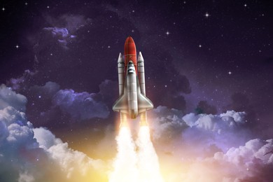 Image of Modern space rocket in beautiful starry sky