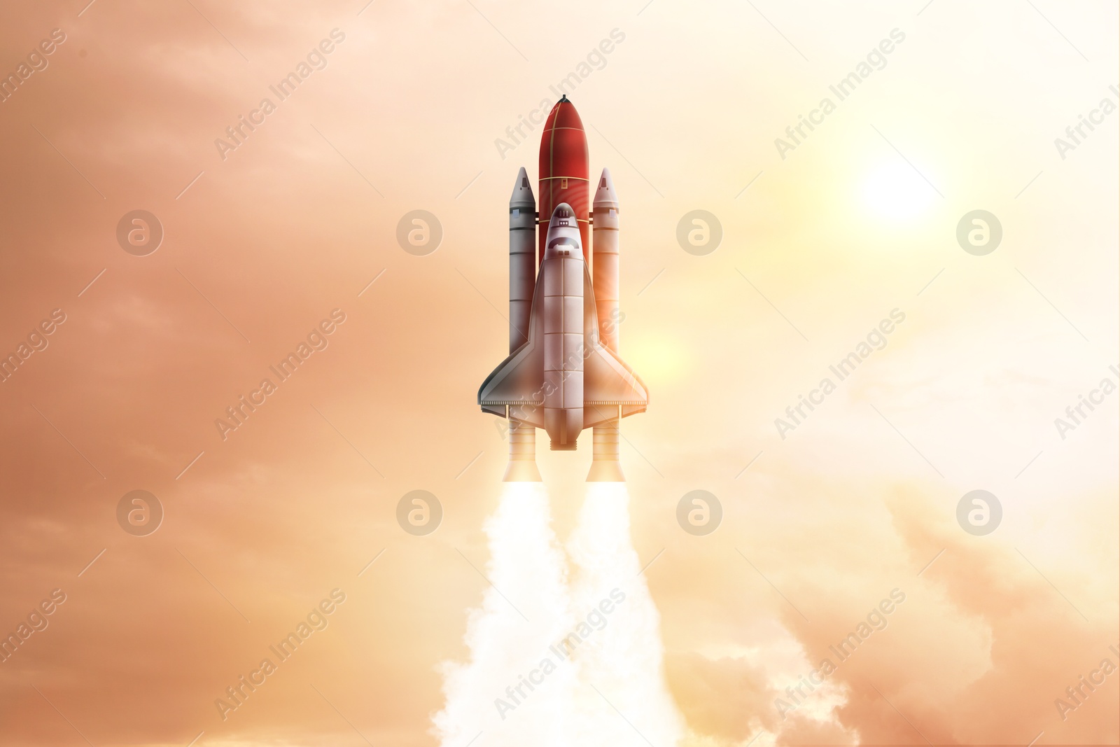 Image of Modern space rocket in beautiful cloudy sky