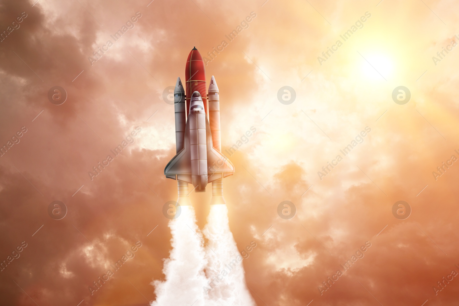 Modern space rocket in beautiful cloudy sky Image of Modern space rocket in beautiful cloudy sky