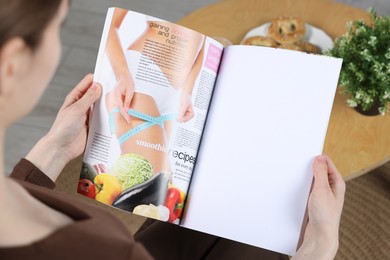 Photo of Woman reading magazine indoors, closeup. Mockup for design