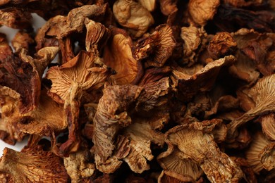 Photo of Many dried chanterelle mushrooms as background, closeup