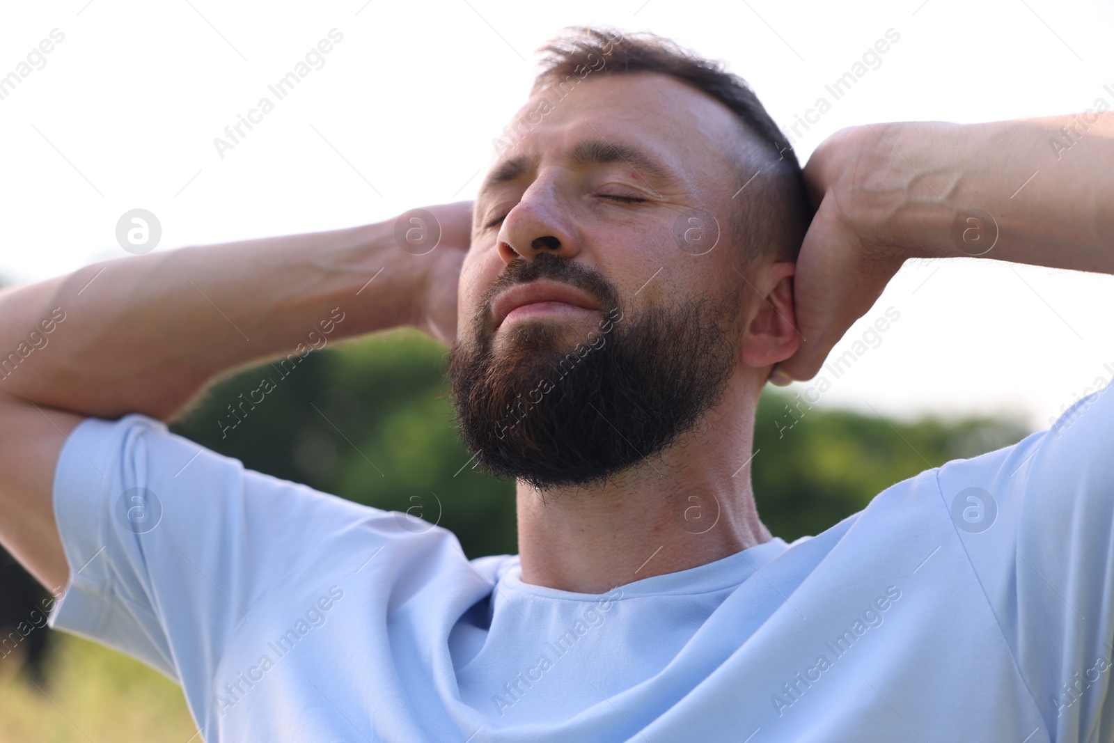 Photo of Feeling freedom. Happy man enjoying time outdoors