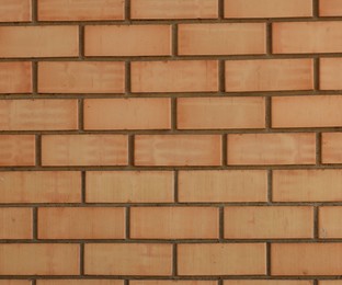 Photo of Texture of red brick wall as background, closeup