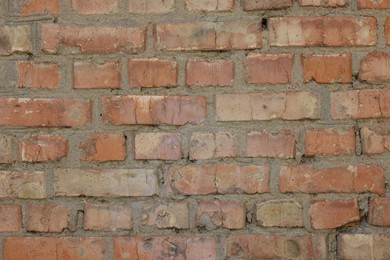 Photo of Texture of old red brick wall as background, closeup