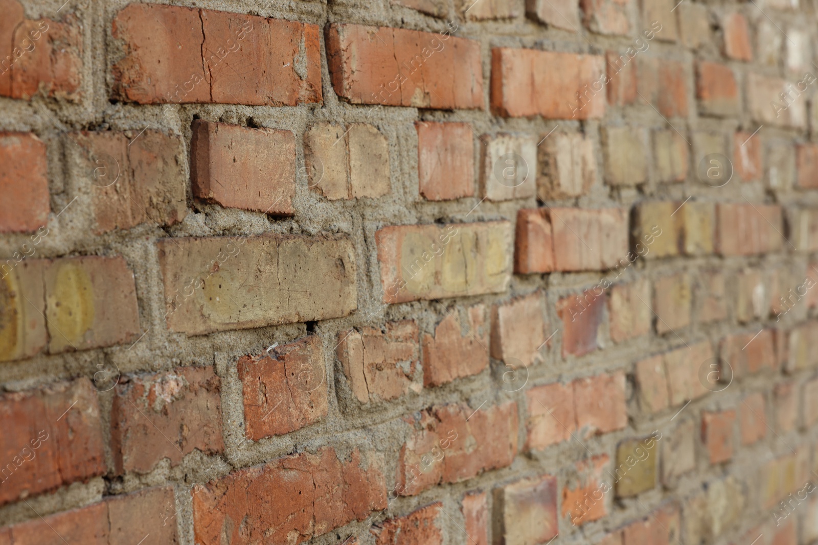 Photo of Texture of old red brick wall as background, closeup