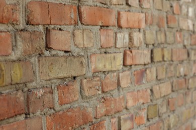 Photo of Texture of old red brick wall as background, closeup