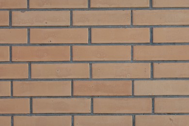 Photo of Texture of red brick wall as background, closeup